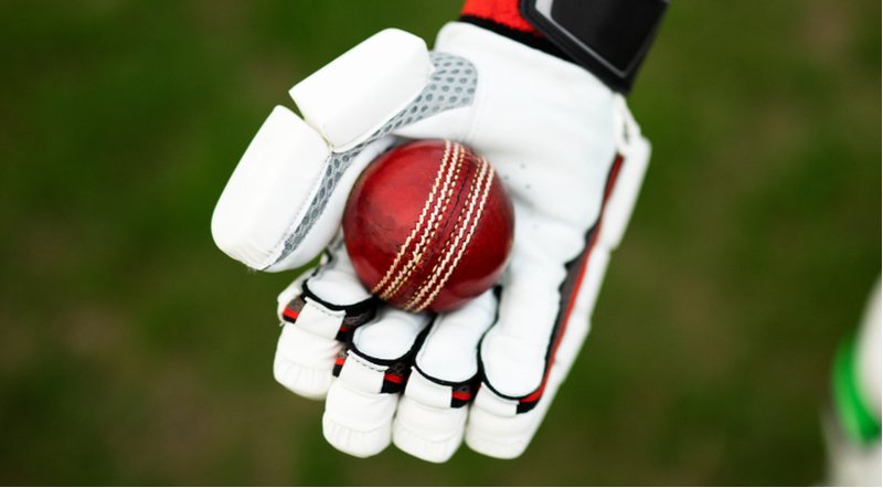 cricket glove and ball
